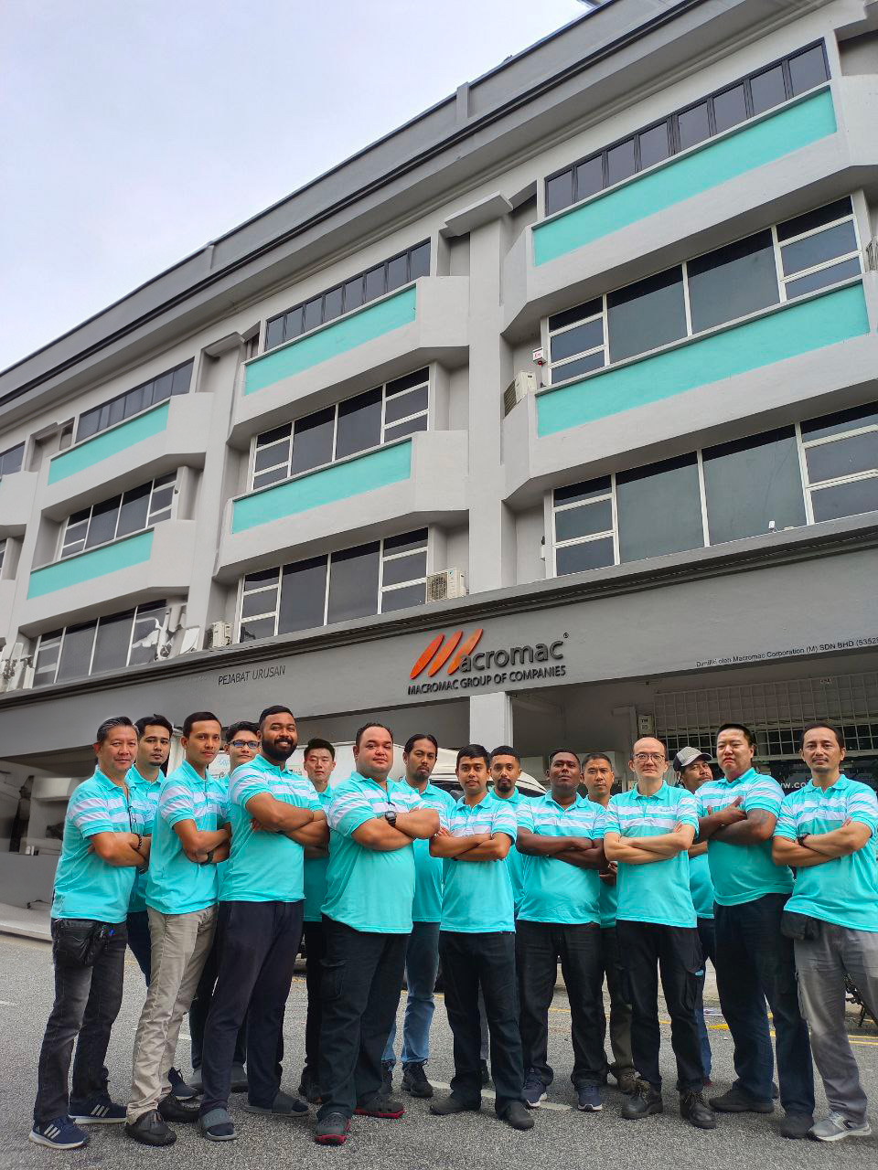 MACROMAC HQ Building and Team Group Photo